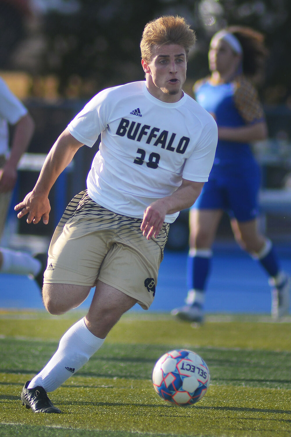 Aiden O’Neill drives the ball back down field